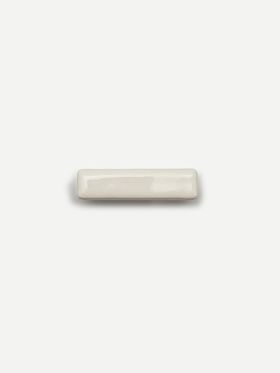 Timeless white rectangular knobs for bathroom vanities.