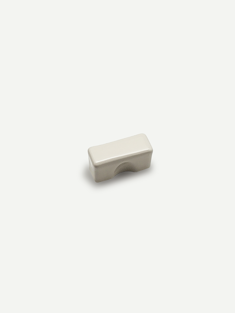 White rectangular cabinet pulls for sleek dresser designs.