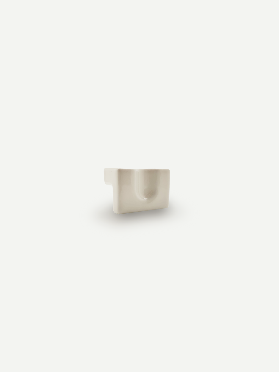 Ceramic white ergonomic cabinet knobs that interior designers love for kitchens.