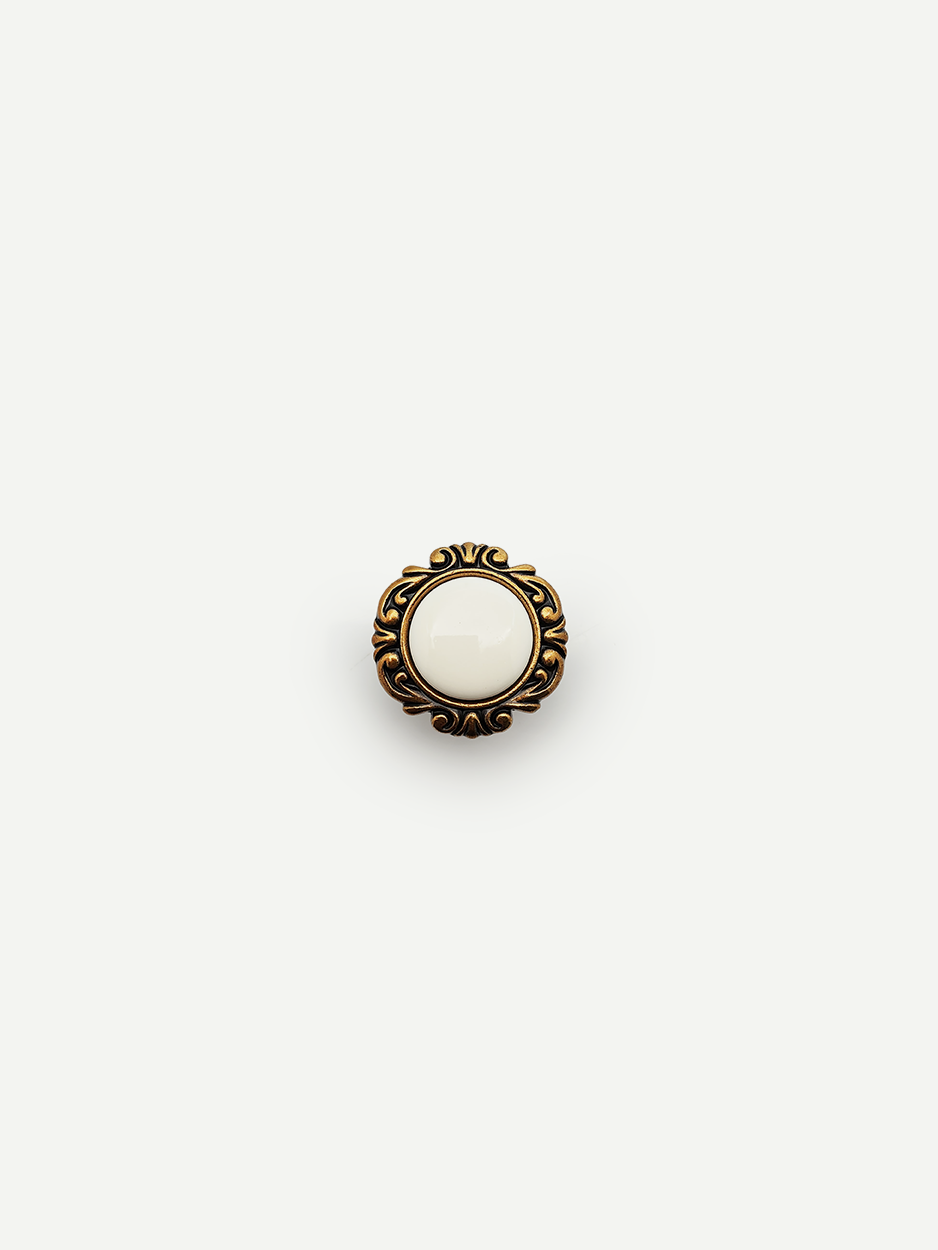 Designer white ceramic knobs for kitchen cabinets and drawers.