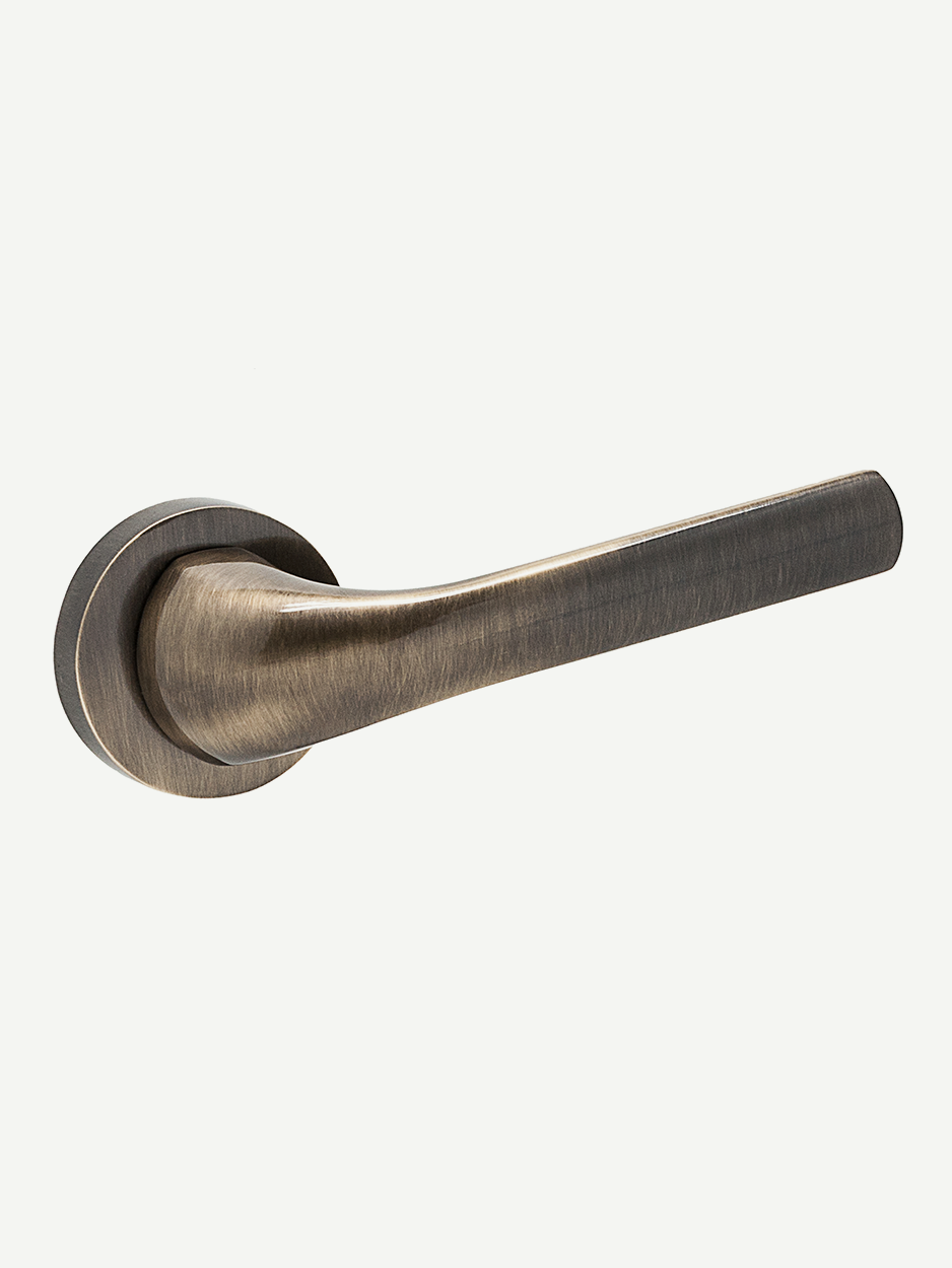 Elegant brass lever handles for high-end furniture doors