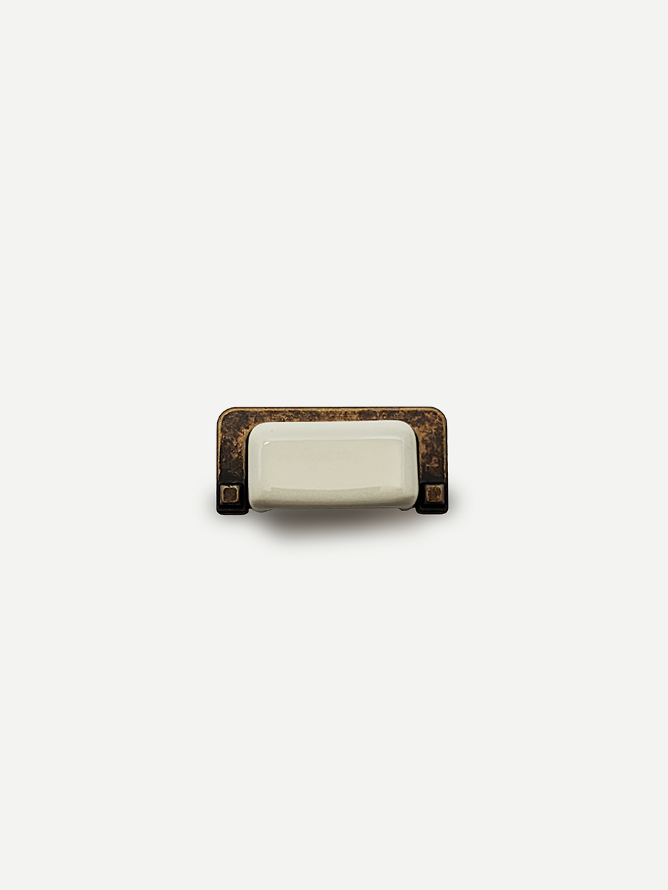 Rectangular cabinet pulls in white and bronze for minimalist interiors.