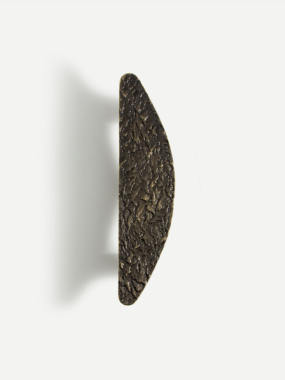 Textured bronze entry door handle pull for luxury homes.