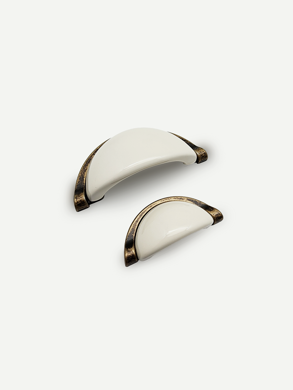 Semi-circle ceramic white drawer pull for chic nightstand design.