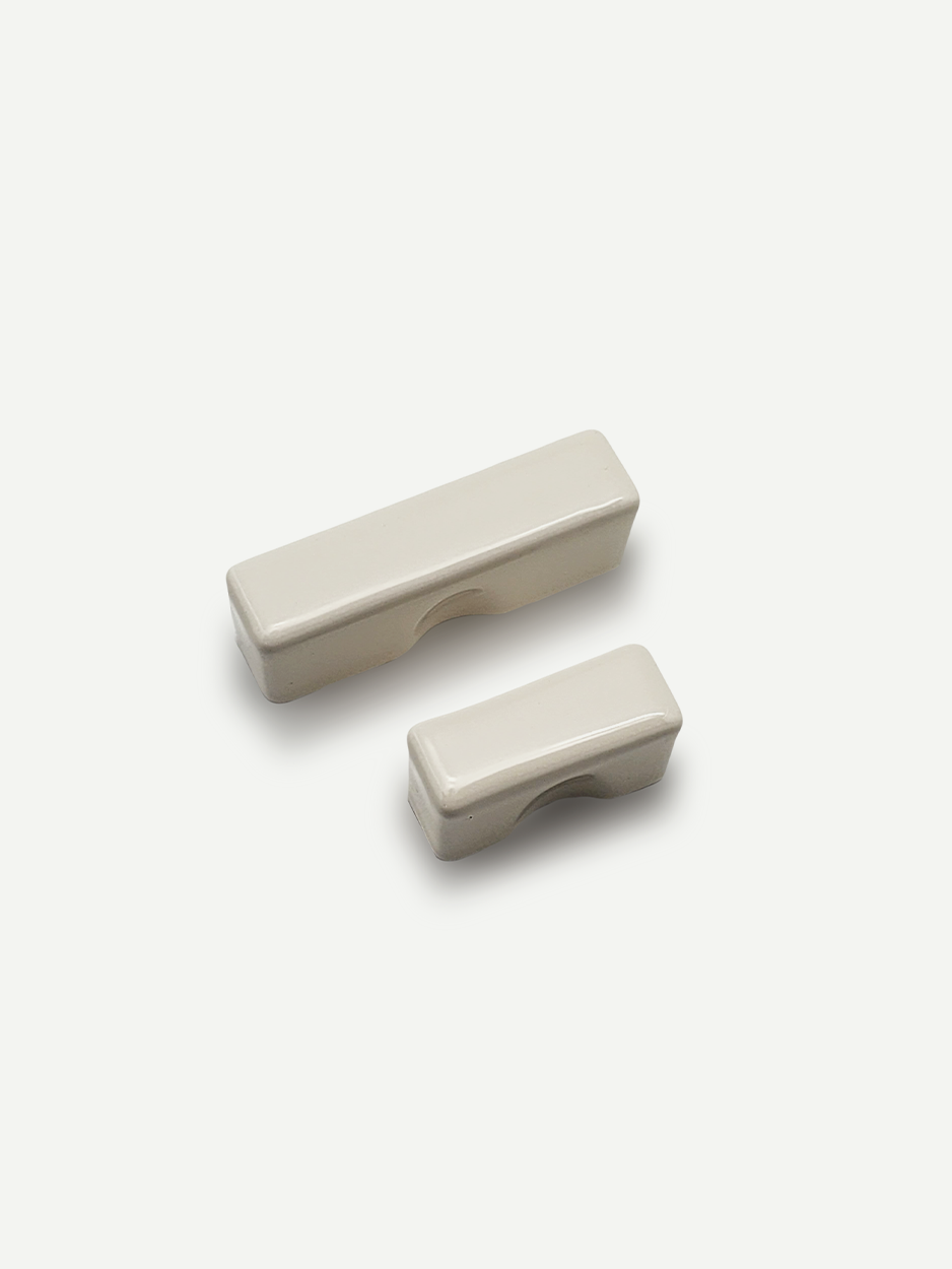 White rectangular ceramic knobs and handles for architects and interior designers.