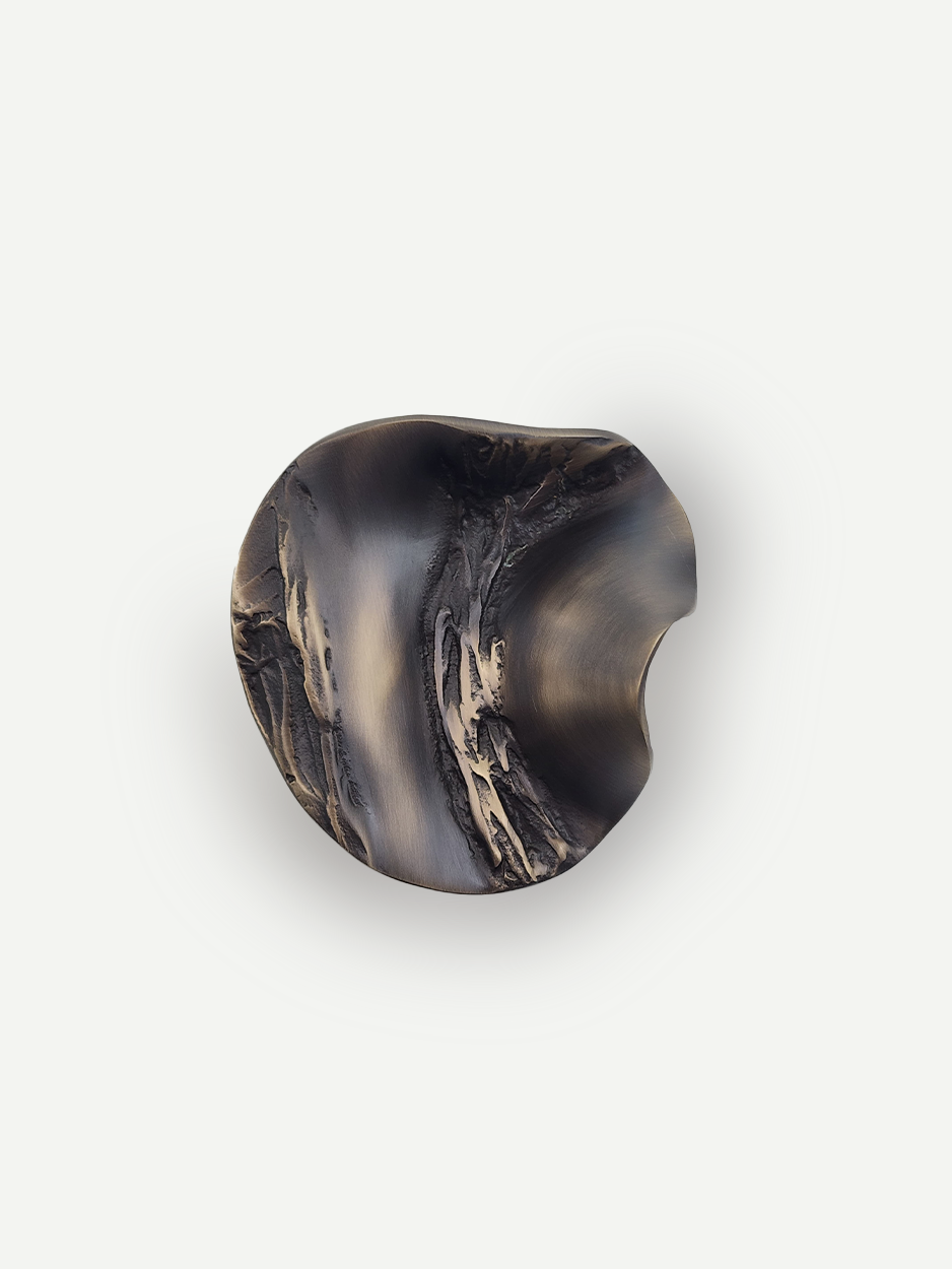 Handcrafted cabinet knobs and pulls for high-end bar cabinets in unlacquered bronze 