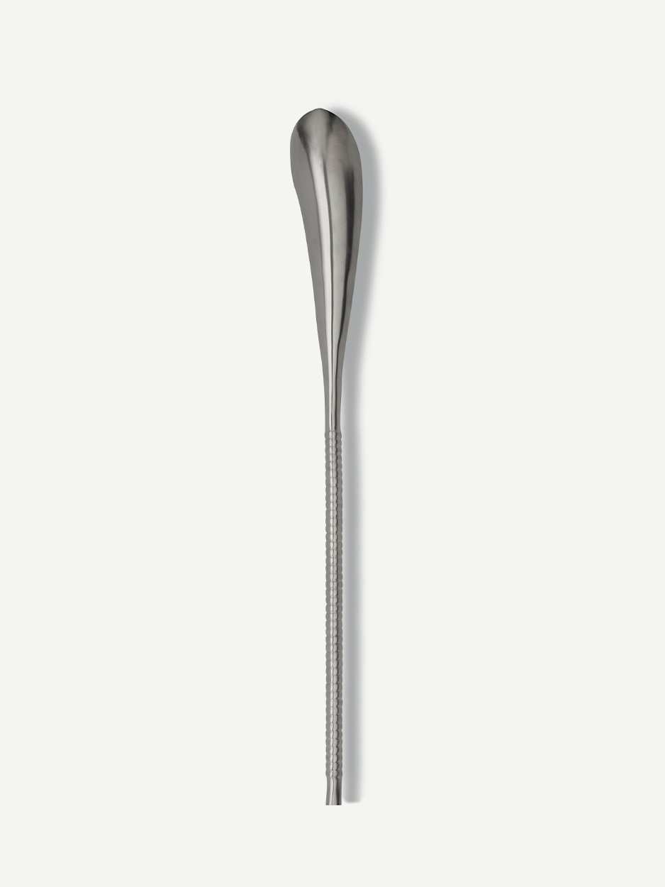 Silver stainless steel front door handle with a twisted grip design 