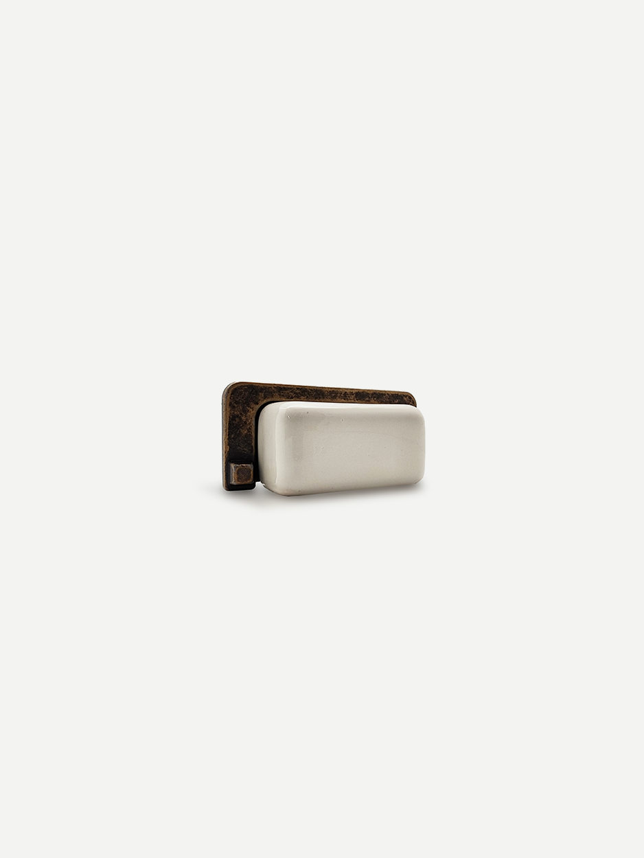 Minimalist rectangular white cabinet pulls for designers.