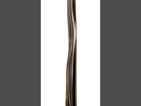 Minimalist entry door pull handle with handcrafted texture.